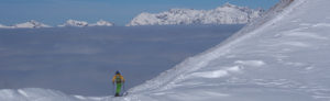 Skier looking into the clouds